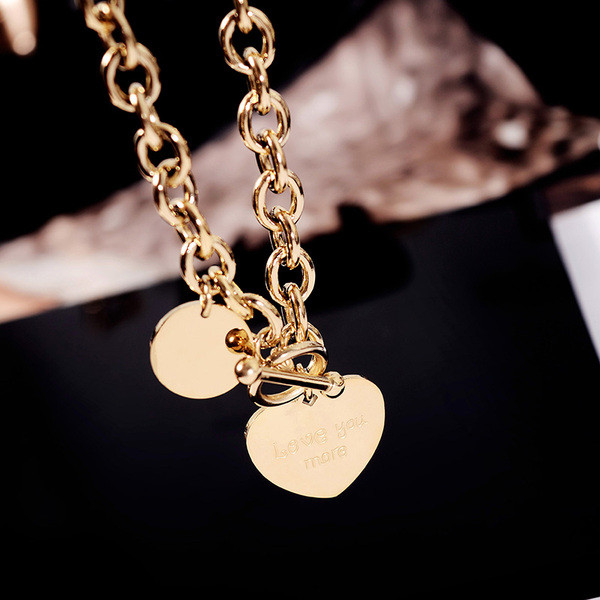 Colier modern de damă din oțel titan cu inimă și inscripție