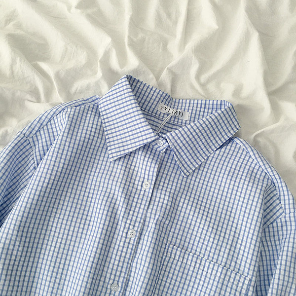 Moderns sieviešu krekls ar klasisku apkakli un kabatu