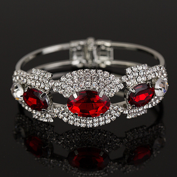 Elegantiška moteriška apyrankė su sidabriniais ir raudonais akmenėliais