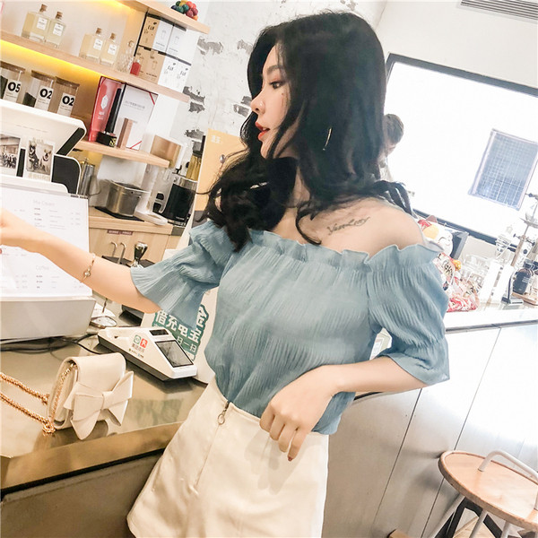 Bluză de damă modernă în albastru și alb cu mâneci 3/4