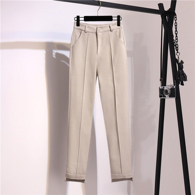 Stilīgs sieviešu bikšu modelis ar augstu vidukli un kabatām