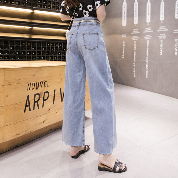 Stiilsed kõrge vöökohaga naiste pikad teksad – lai mudel