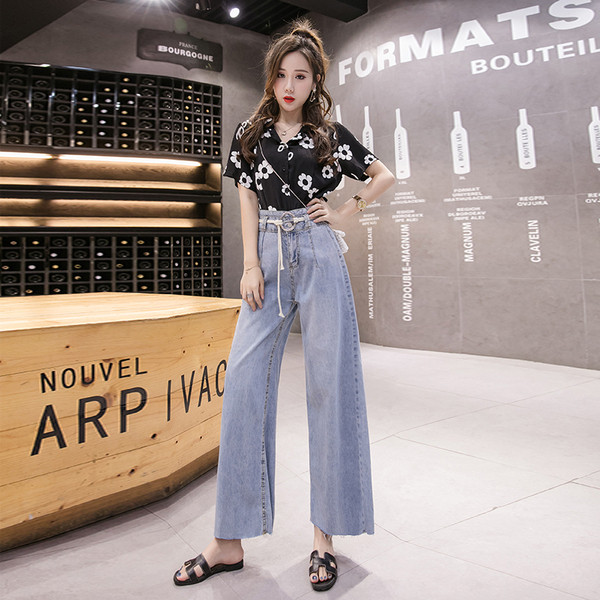 Stiilsed kõrge vöökohaga naiste pikad teksad – lai mudel