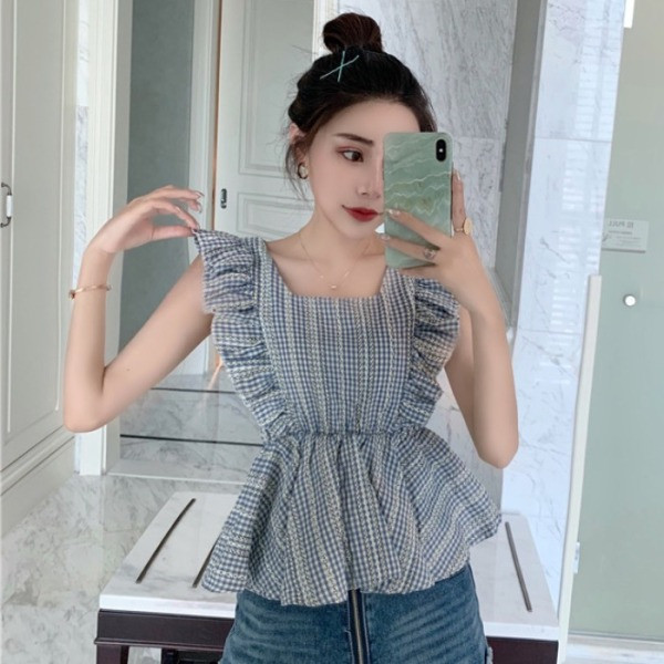 Igapäevane lokkidega naiste topp