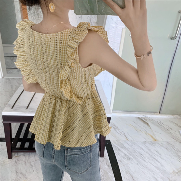 Igapäevane lokkidega naiste topp