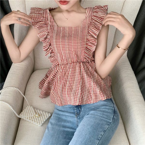 Igapäevane lokkidega naiste topp