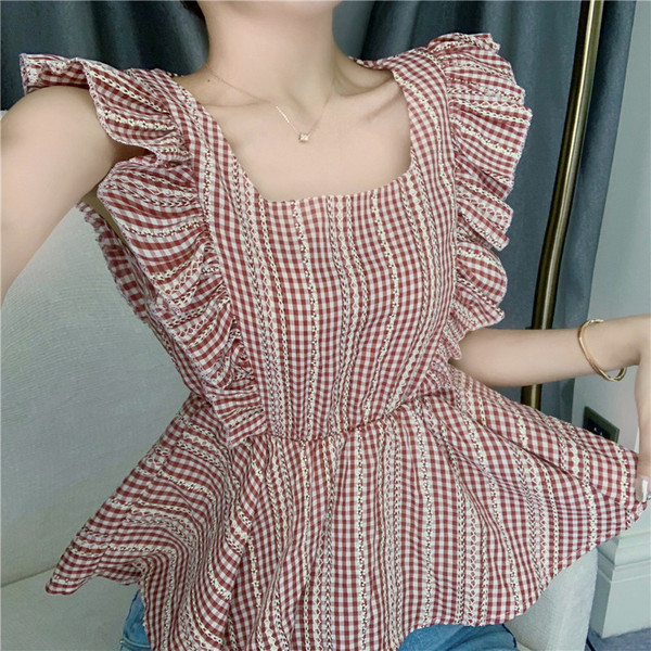 Igapäevane lokkidega naiste topp