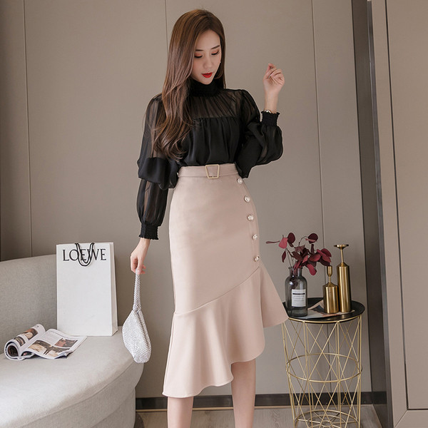 Sieviešu asimetrisks svārki ar pogām un jostu