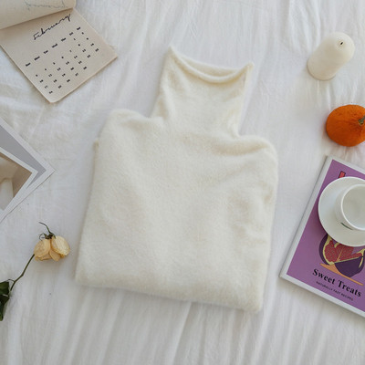 Női pulóver magas gallérral