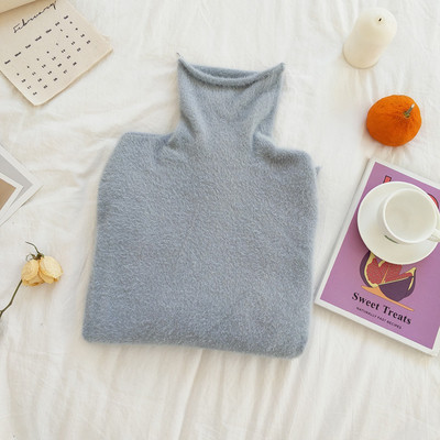 Női pulóver magas gallérral