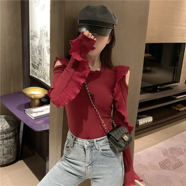 Γυναικεία μπλούζα στενή εφαρμογή με κομμένα κομμάτια και βολάν