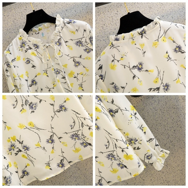 Šarena ženska bluza s niskom kragnom i cvjetnim uzorkom