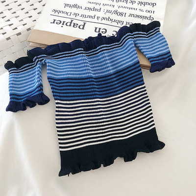 Testhezálló női blúz ejtett ujjakkal és fürtökkel