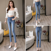 Női farmer magas derékkal Karcsú modell szakadt motívumokkal