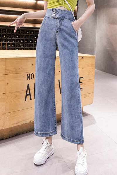 Modern női hosszú farmernadrág magas derékkal és kék zsebekkel