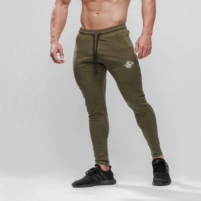 Спортно-ежедневен мъжки панталон Slim модел с еластична талия и бродерия