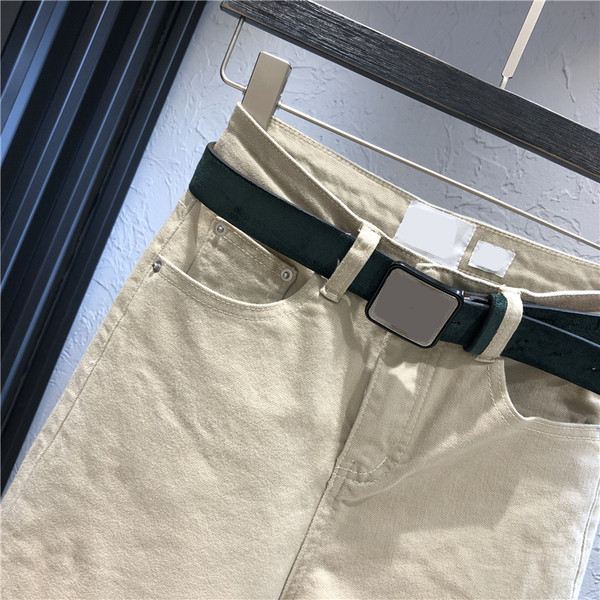 Alkalmi női farmer övvel, magas derékkal, bézs színben