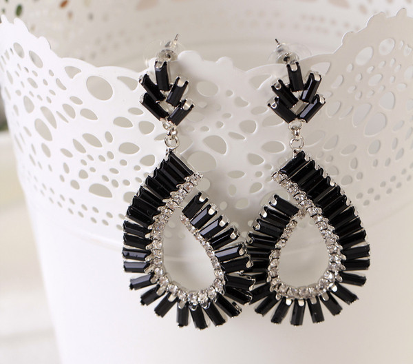 Γυναικεία μοντέρνα κρεμαστά σκουλαρίκια με  πέτρες