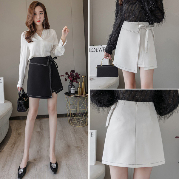 Modernus moteriškas sijonas aukštu juosmeniu ir A formos raiščiais