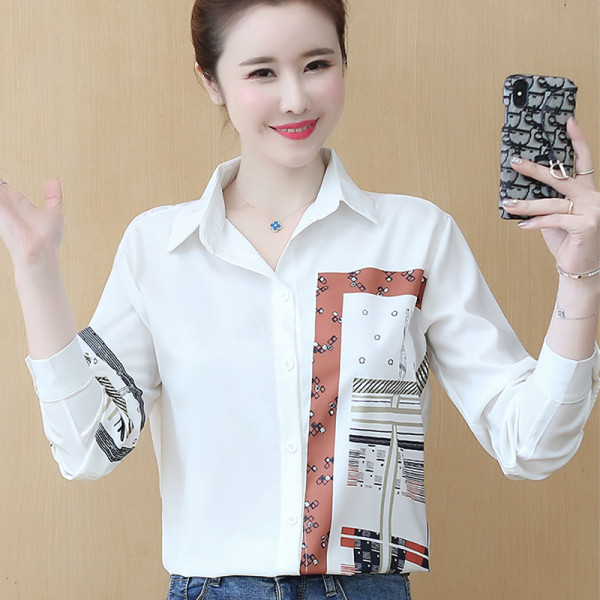 Moderns sieviešu balts krekls ar klasisku apkakli un aplikāciju