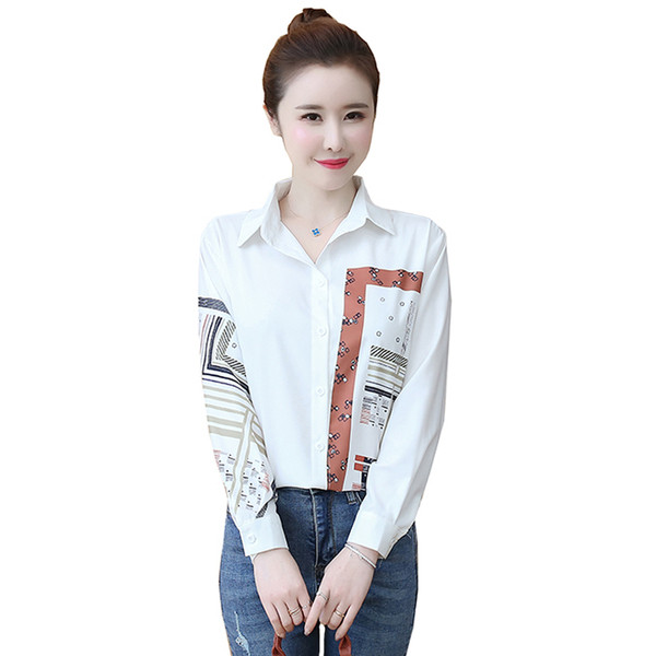 Moderns sieviešu balts krekls ar klasisku apkakli un aplikāciju