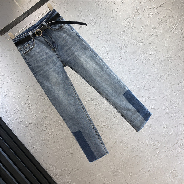 Sieviešu džinsi ar jostu un augstu vidukli - taisns modelis