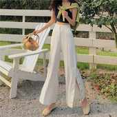 Pavasarinės moteriškos kelnės aukštu juosmeniu, sagomis ir nėriniais