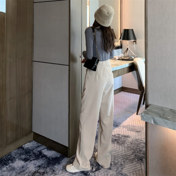 Naiste pikad püksid kõrge vöökohaga laia mudeliga