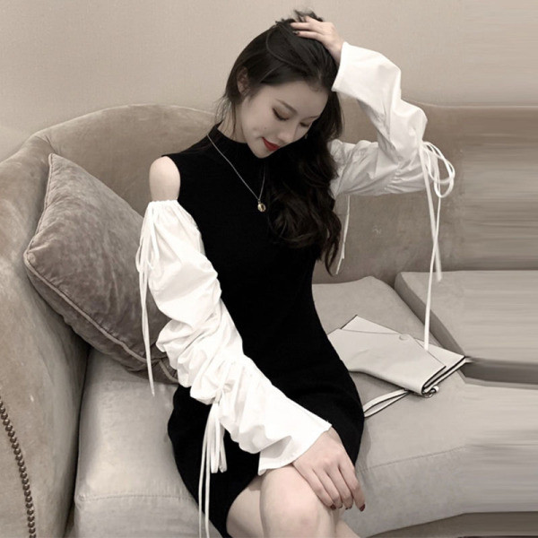 Sieviešu īsā kleita ar atkailinātiem pleciem un saitēm