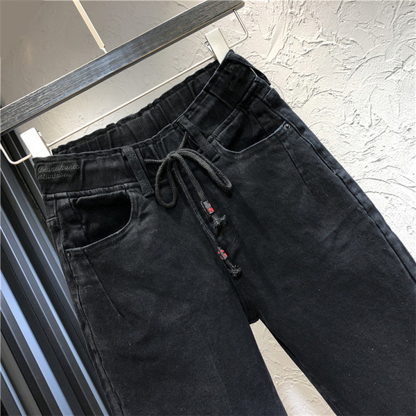 Naiste vabaaja pikad teksad paelte ja taskutega