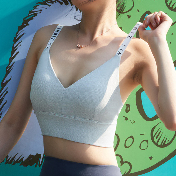 Naiste V-kaelusega, polsterduse ja kirjadega rihmadel sportlik rinnahoidja