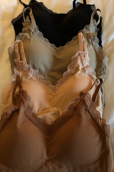 Libisev naiste topp spitsikaela ja pitsiga