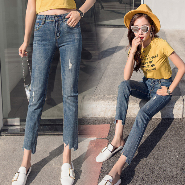 Női farmer Karcsú modell magas derékkal, szakadt motívumokkal