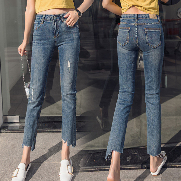 Női farmer Karcsú modell magas derékkal, szakadt motívumokkal