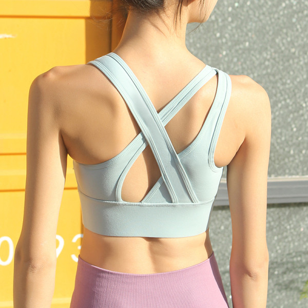 Elasztikus női sportmelltartó cipzárral és keresztpántokkal