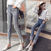 Aktuālie sieviešu džinsi ar kabatām-Slim modelis