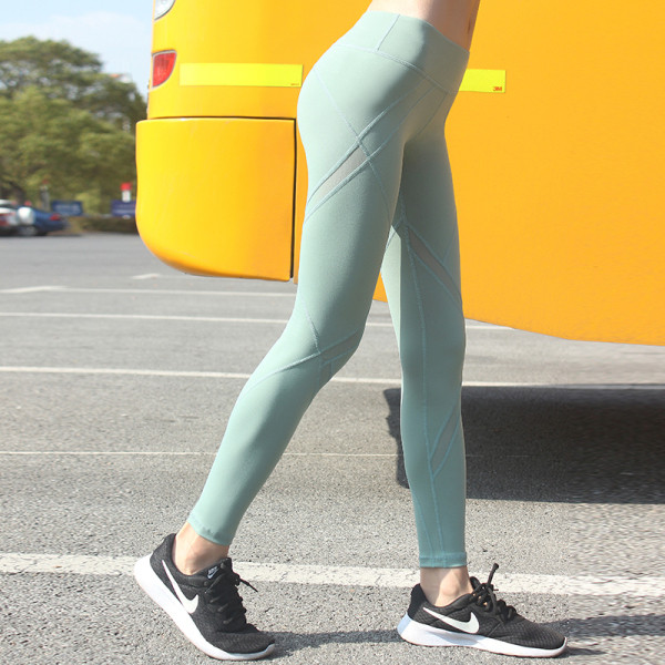 Sportos elasztikus női leggings gyorsan száradó és légáteresztő anyagból, magas derékkal