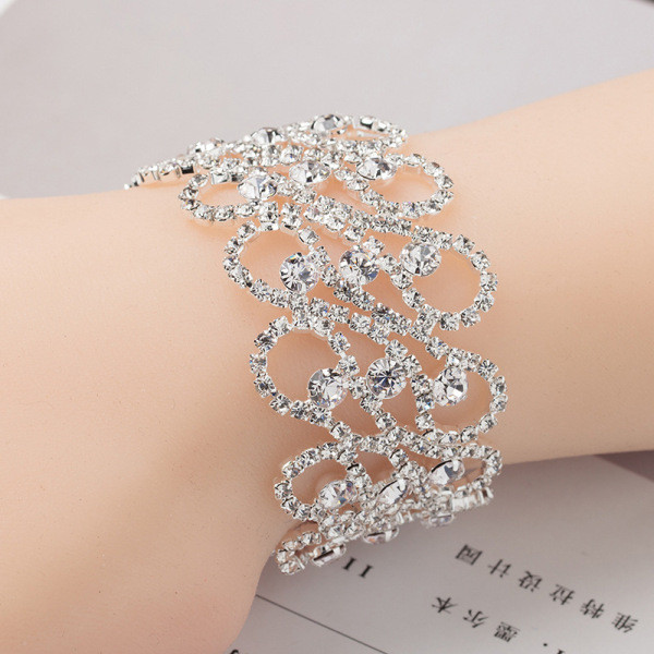 Brățară elegantă de damă din aur și argint cu pietre