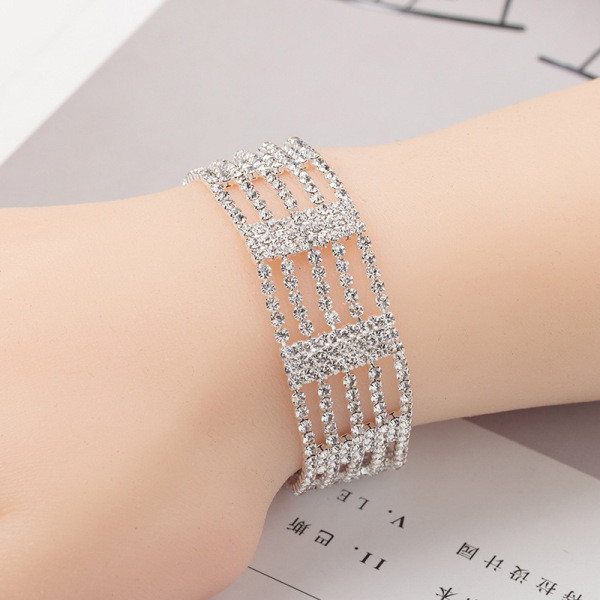 ÚJ modell női karkötő arany és ezüst kövekkel