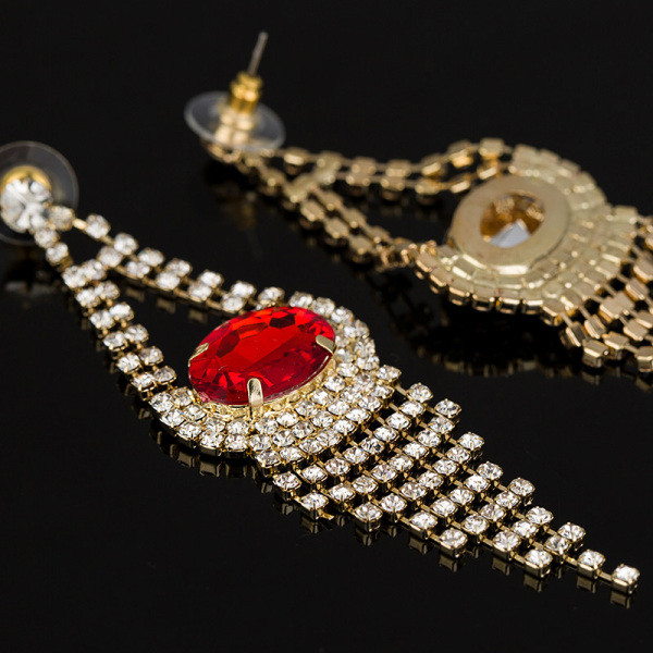 Κομψά γυναικεία κρεμαστά σκουλαρίκια με κόκκινες πέτρες