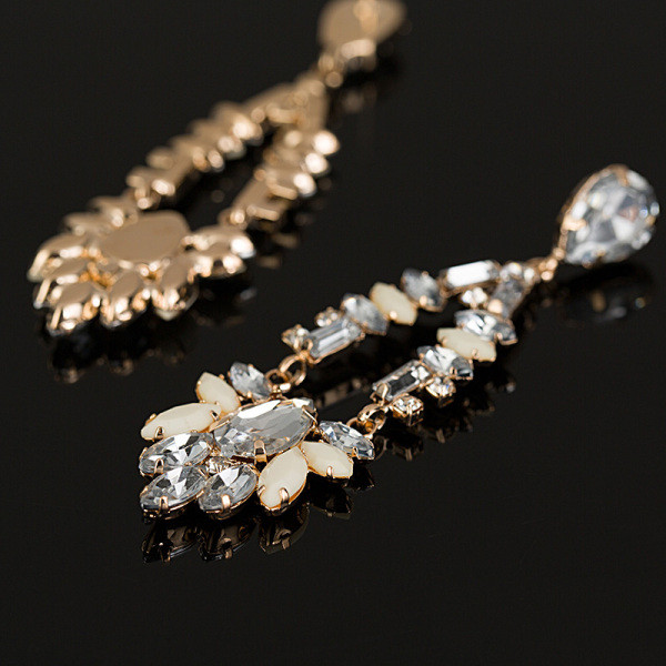 Stilīgi sieviešu auskari ar baltiem un sudraba akmeņiem