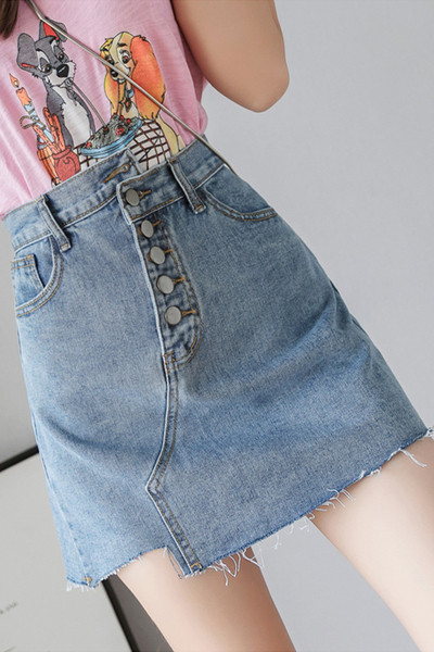 Asimetriski džinsa svārki ar pogām un kabatām