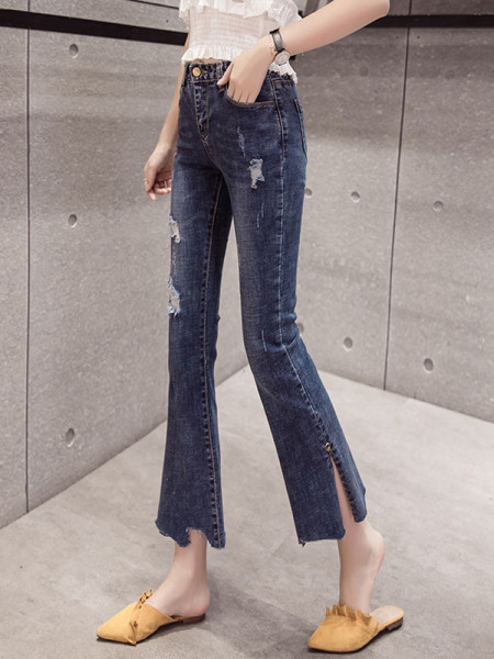 Aktuāli sieviešu džinsi ar kabatām un saplēstiem motīviem