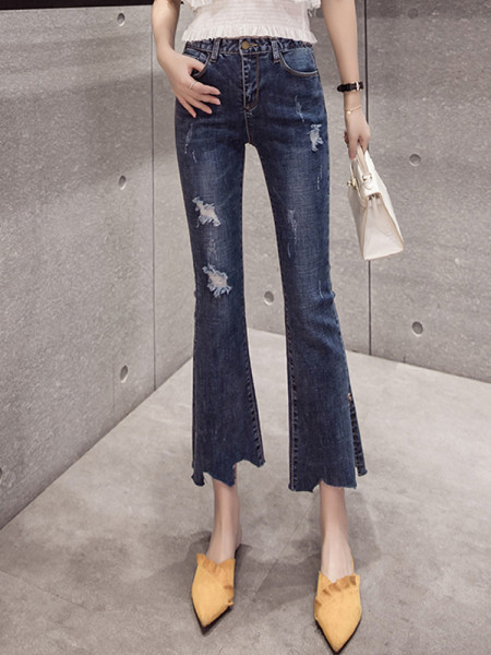 Aktuāli sieviešu džinsi ar kabatām un saplēstiem motīviem