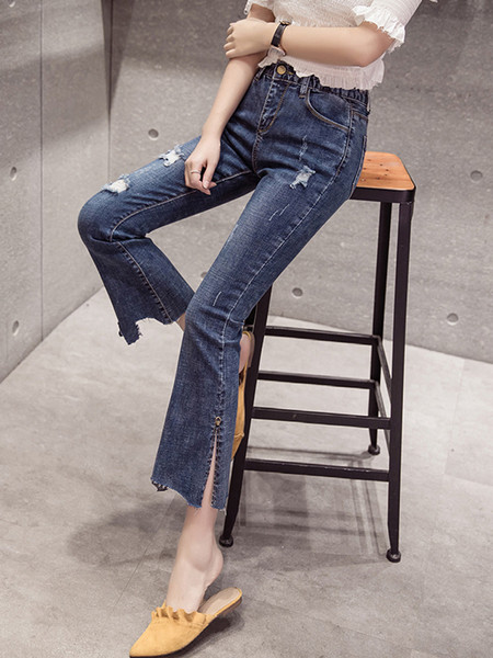 Aktuāli sieviešu džinsi ar kabatām un saplēstiem motīviem