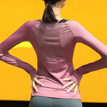Спортна дамска блуза от бързосъхнеща и дишаща материя с дълъг ръкав