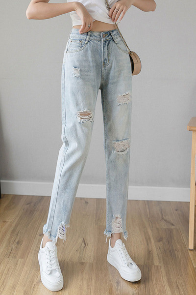 Ikdienas sieviešu garie džinsi ar saplēstiem motīviem