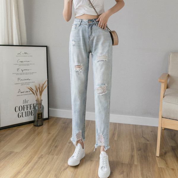 Ikdienas sieviešu garie džinsi ar saplēstiem motīviem