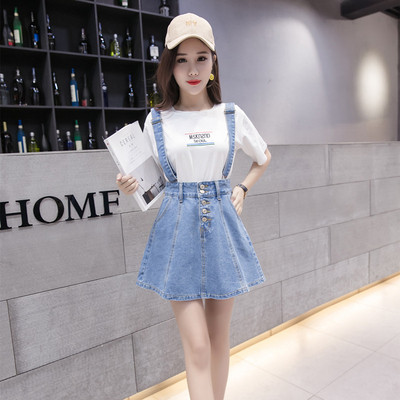 Iškirpto modelio moteriškas džinsinis sijonas su petnešėlėmis