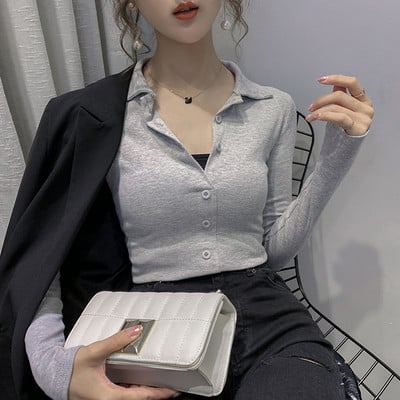 Moteriška palaidinė su sagomis ir klasikine apykakle